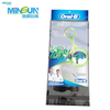 Retail toothbrush packaging with blue‑green design, Oral‑B logo, product claims, and two people in lab coats.