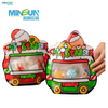Festive Christmas gift bags shaped like buses with Santa Claus and clear windows for treats