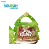 Christmas-themed snack packaging featuring tree-shaped bag and red bag with Santa bear design