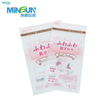  Pink‑white microfiber hair turban package with illustrations showing usage steps and bilingual product text.