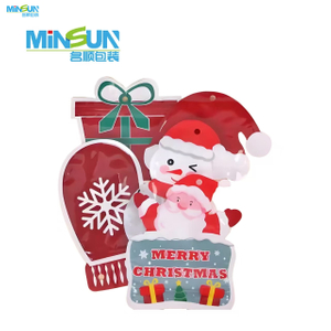 Colorful Christmas packaging bags with Santa design, bus shape, and transparent window